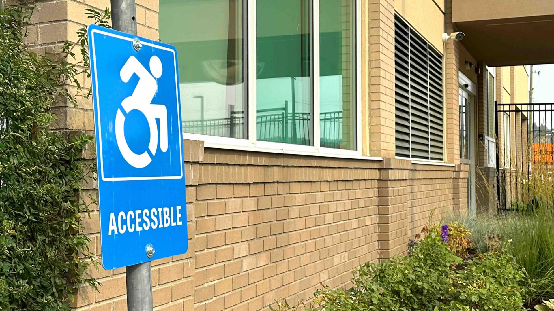 accessible parking lot sign