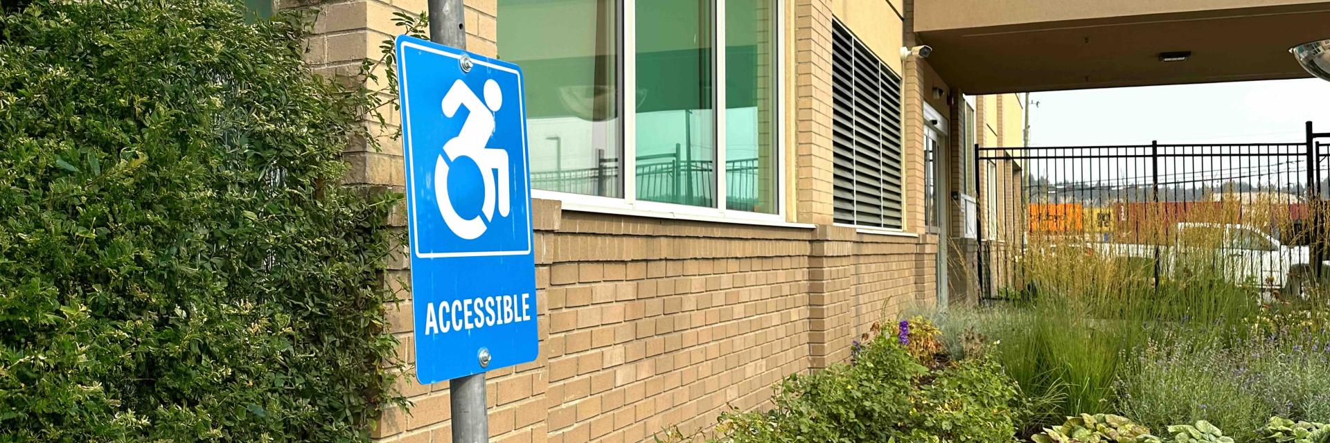 accessible parking lot sign