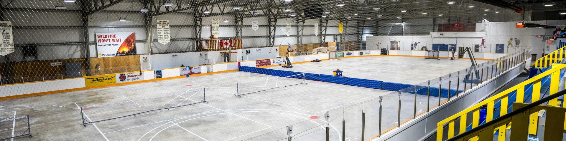 empty ice arena with bleachers