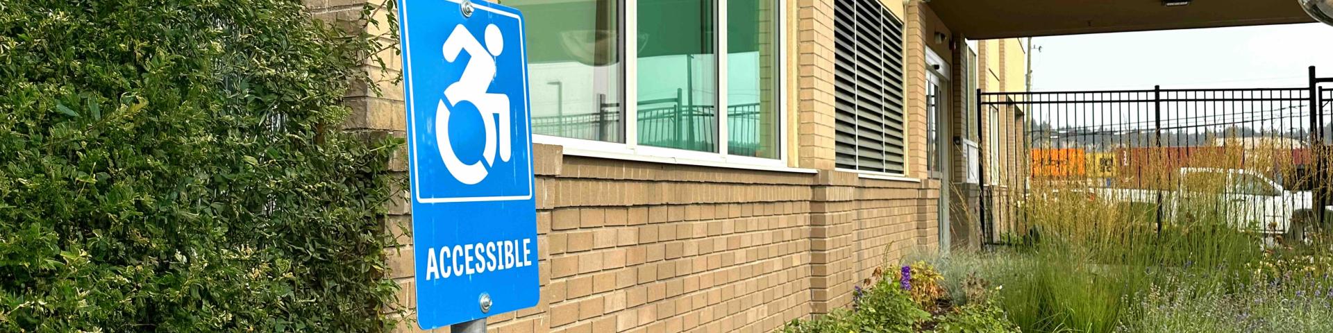 accessible parking lot sign